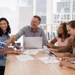 executives-shaking-hands-in-the-meeting-2023-11-27-04-58-12-utccc